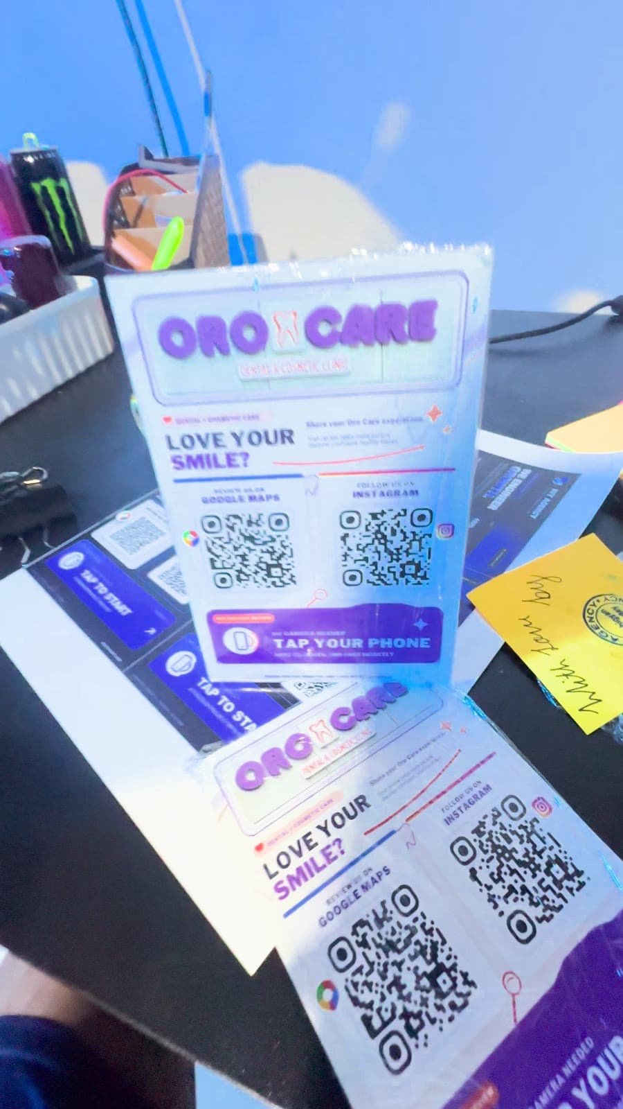 A custom acrylic QR and NFC stand in production